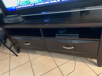Tv stand in dark wood
