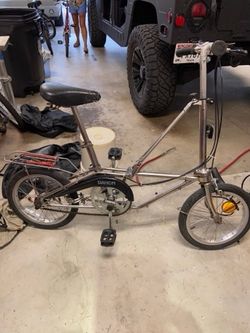 Stainless steel Dahon folding bike. Good condition. $160