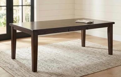 New Signature Design Ashley Traditional Rectangular Dining Extension Table, Seats Up To 8