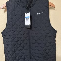 Nike Women’s Vest , Size # M - L , $50 Each Firm 