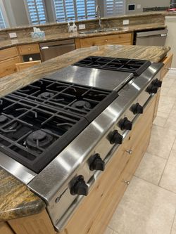 GE Monogram 42″ cooktop with 6 burners and a griddle