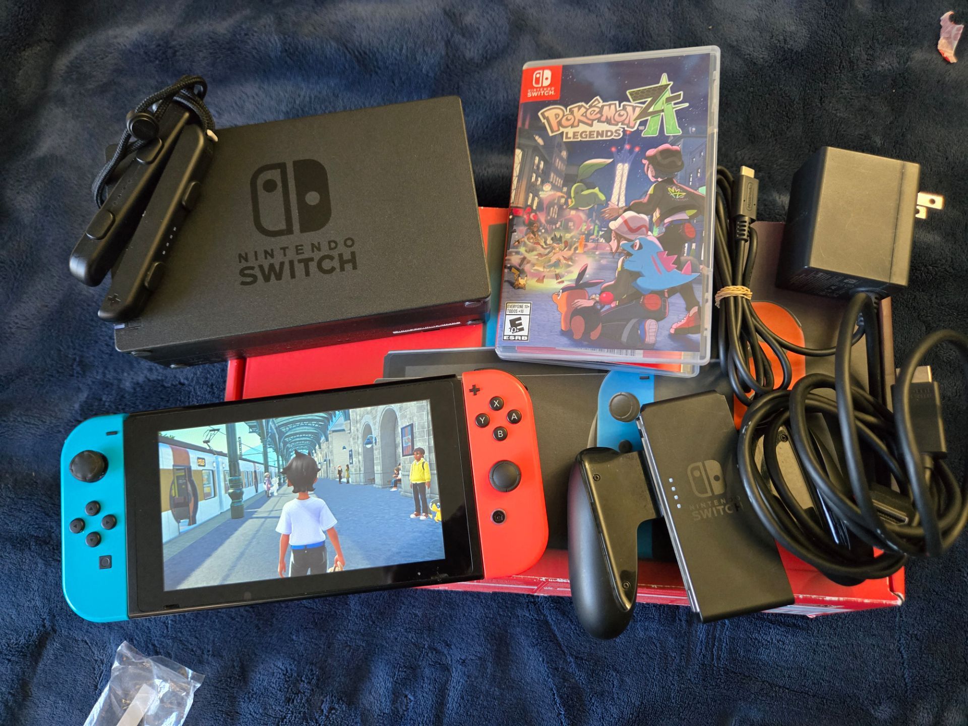 Nintendo Switch with Pokémon Legends Z A with Ring Fit Adventure & Boardwalk Arcade 2
