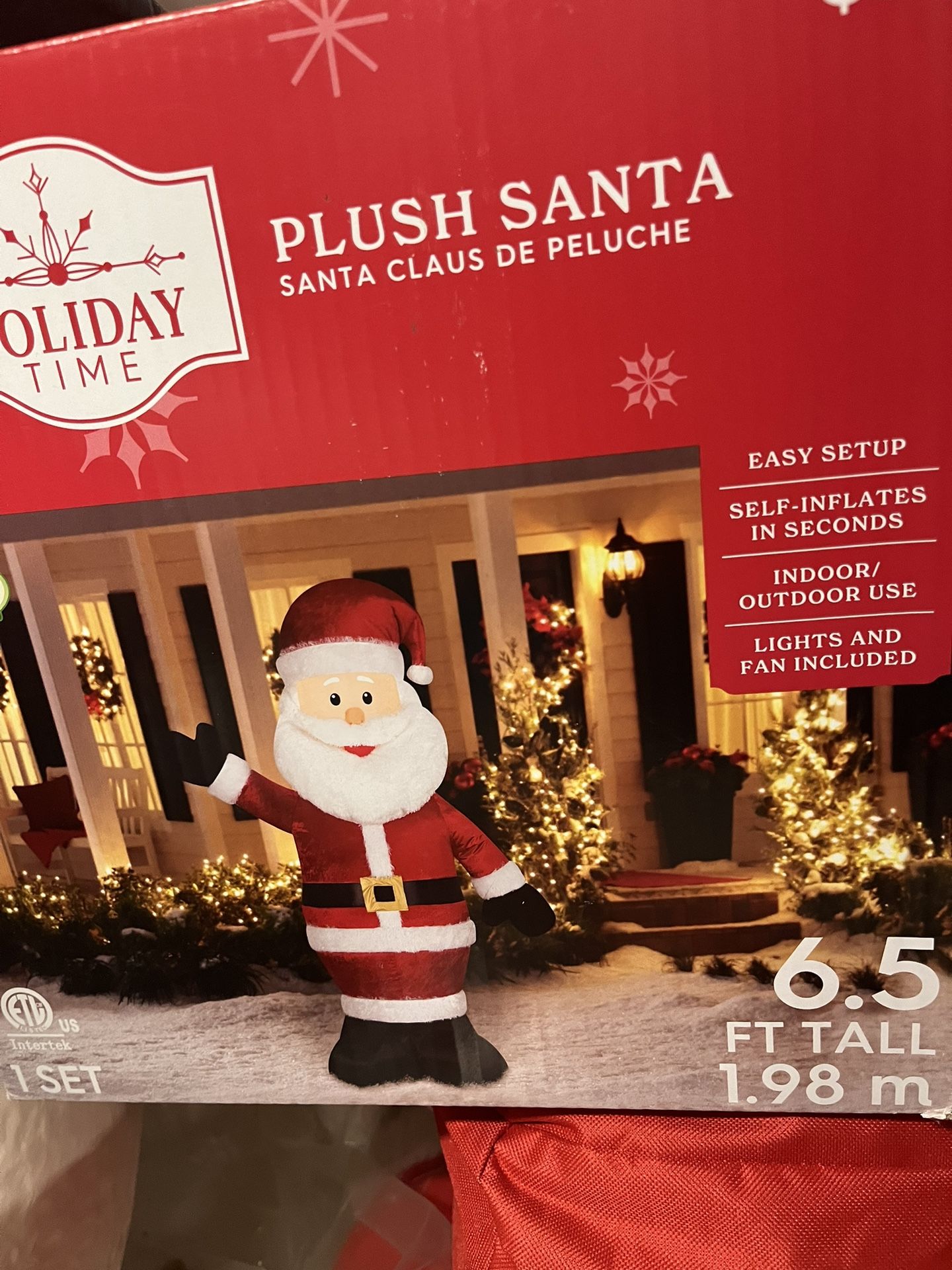 The Holiday Time Large 6.5FT Plush Santa Holiday Yard Inflatable