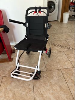 NEW  wheelchair foldable 16” W