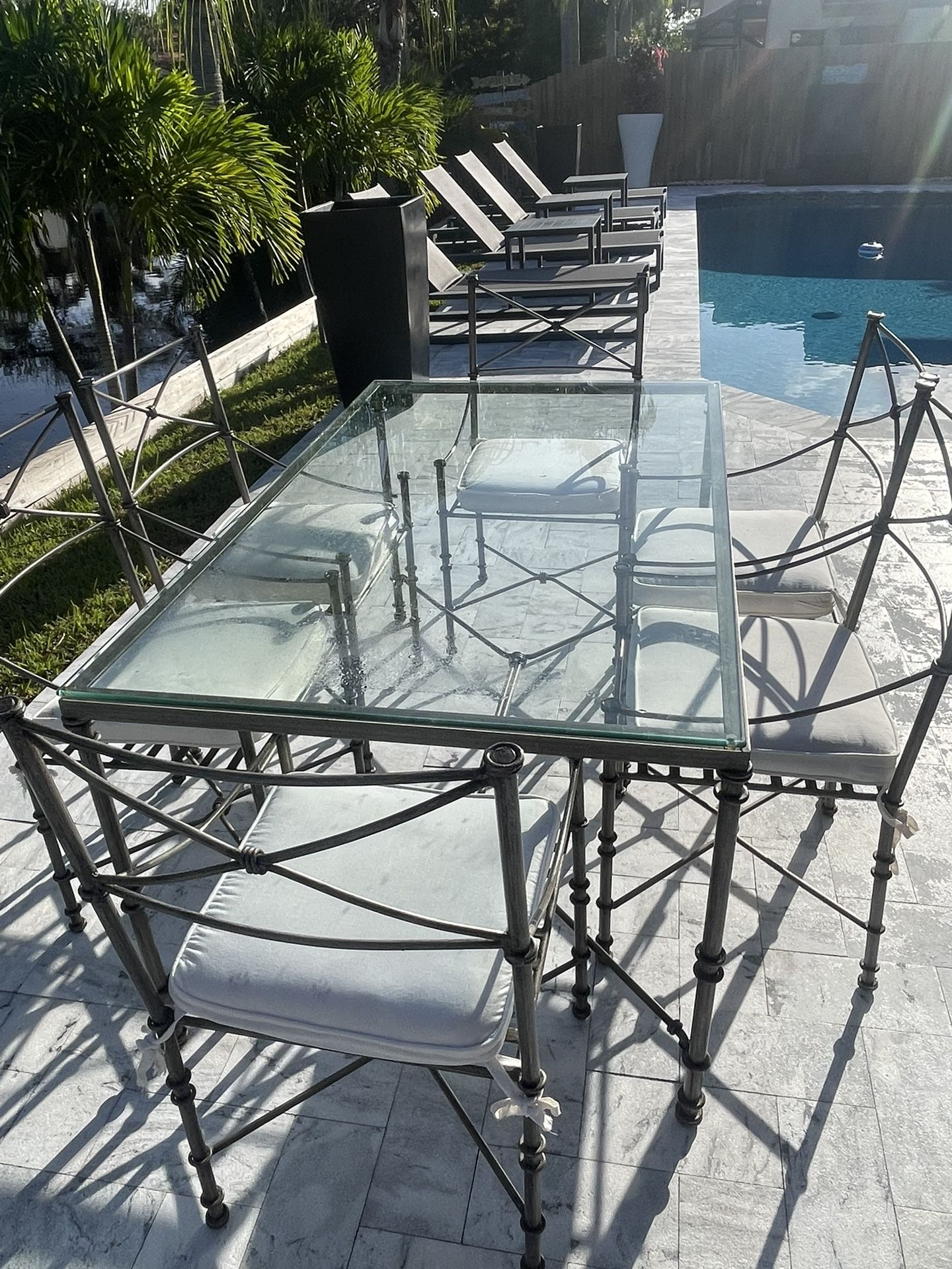 Outdoor vintage wrought iron dining, set six chair, chairs, and side table in perfect condition. Perfect for alfresco dining.