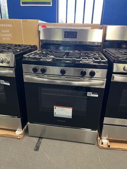 Frigidaire stainless steel and black gas range