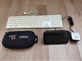 Apple keyboard, Amazon Echo Show 5, Thule tech organizer pouch