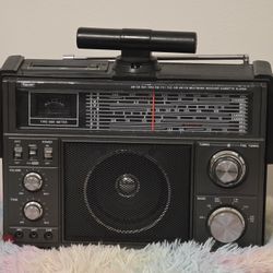 The item is a vintage Rhapsody RY-611 multi-band radio and cassette player. 