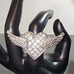Angel wings on heart ring