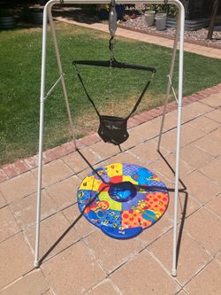 Jolly jumper with noise making mat
