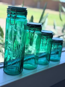 Vintage green glass hermetic 12-sided canister set with wire bail seal