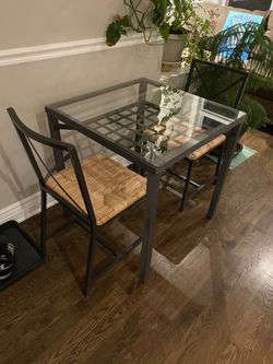 Ikea glass top table and chairs hot sale