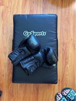 Venum boxing gloves and practice pad