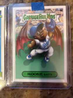Mookie Betts Lot including a Betts Garbage Pail Kid Card (MOOKIE BATS) and a shadow box with a color match Nike
