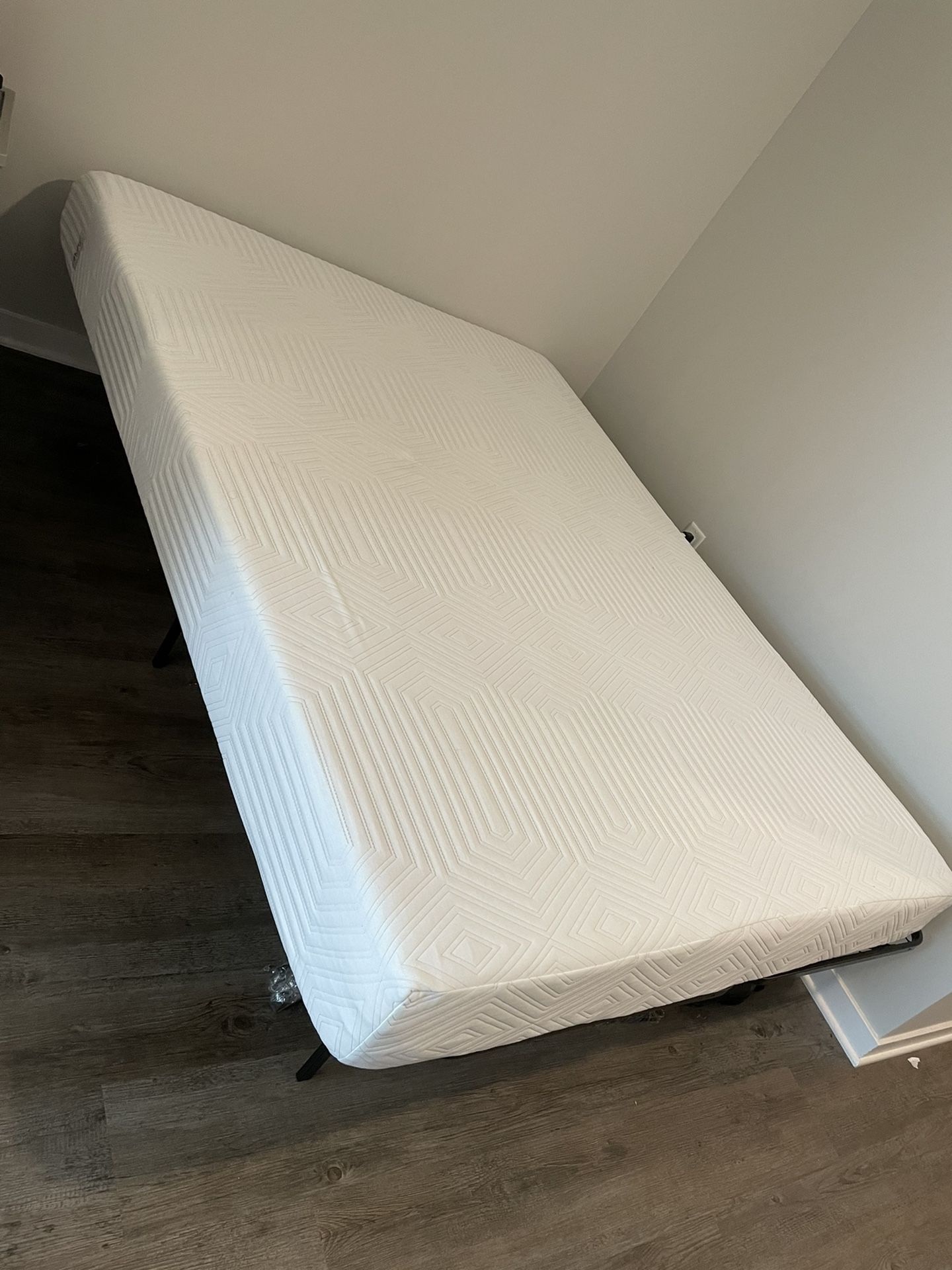 Queen size mattress + frame, less than 1yr old!