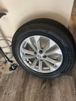 New tire mounted on original factory Nissan Rogue Rim mounted and balanced  225/R65 17 $125 non-negotiable