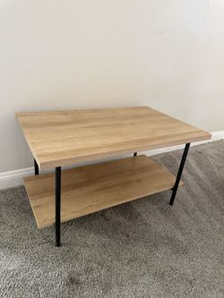 Light Oak Color And Black Metal Coffee Table