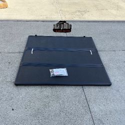 Nissan Frontier 2005. 2018 Heard TRS  Flip Bed Cover.