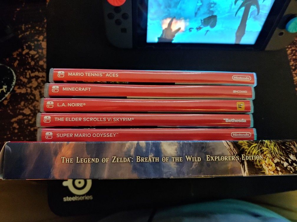 Like New Nintendo Switch with 4 Games and a Case