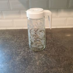 Vintage Tang glass pitcher with lid. 