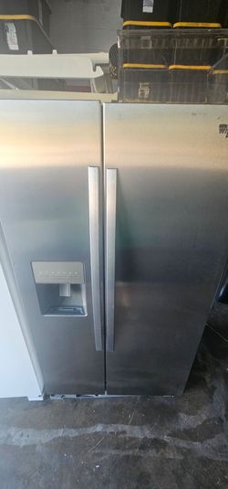 Whirlpool Stainless Side By Side Refrigerator Plugged In Cold