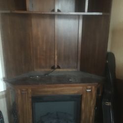 Tv stand entertainment center with electric heater fireplace $150obo