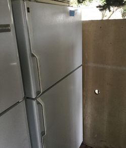 Top and bottom 33 inch refrigerators/ one year warranty/ delivery and installation are available