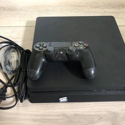 PlayStation 4, Slim,  1TB W/ 2 controllers & 1 Game:  Red Dead ll Included 
