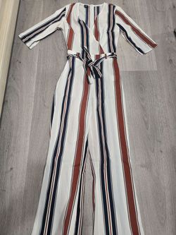 Like New stripped jumpsuit size small