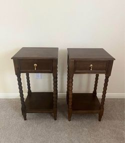 Two same brown real wood nightstands spindle legs