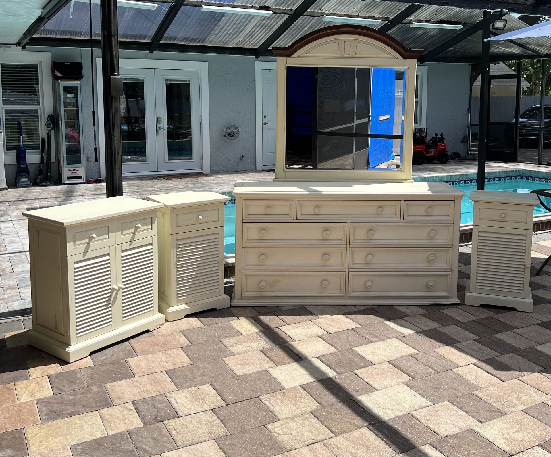(5 piece) dresser set. Dresser,mirror,2 night table and wardrobe.White vintage furniture. I can deliver for an additional cost.Tommy Bahamas.