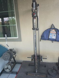 Gym equipment weights and pull down machine all for $300