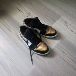 Gold air jordan lows