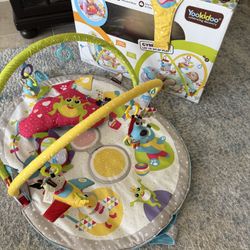 baby gym and play mat. Lay to sit up.
