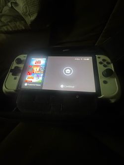 QLED Switch with Hardcase , Dock, Grips with extra sizes and d pad on left joy stick $300