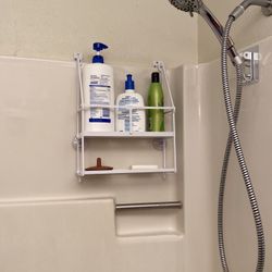 Shower Rack Mounted On Drywall Above Enclosure 