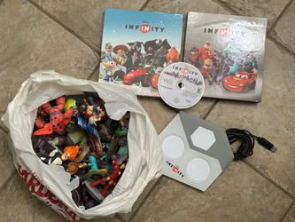 Nintendo Wii Disney Infinity Game, figures, power discs, and pad