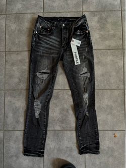Ripped Purple Jeans