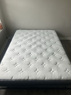 Queen sized mattress with LED bed frame