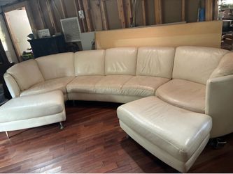 Off white genuine leather sofa with 2 foot stools