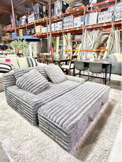 Grey fabric oversized plush chair