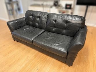 Black leather sofa.