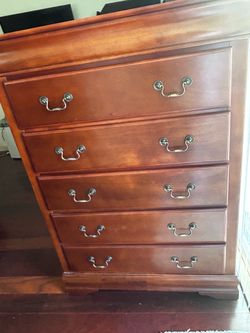 Red wood dresser w/the bed