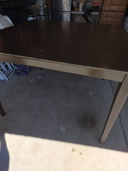 Dark Brown Wooden Dining Table