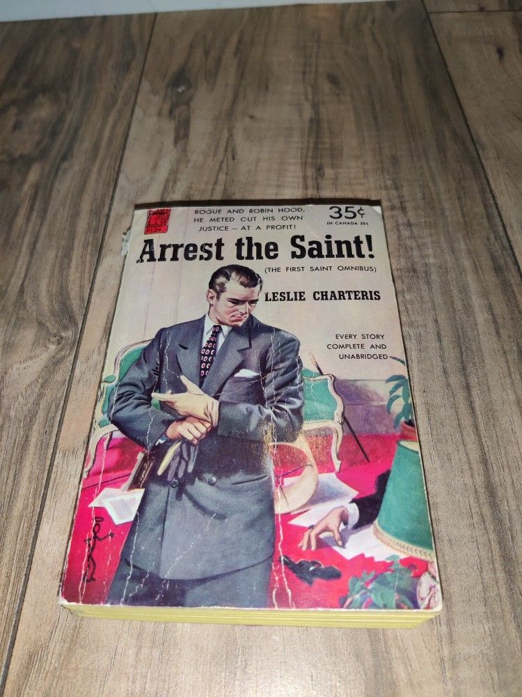 Arrest the Saint - Leslie Charteris (1951 Perma Books paperback). Has some wear and minor damage from age and storage. Sold as is.