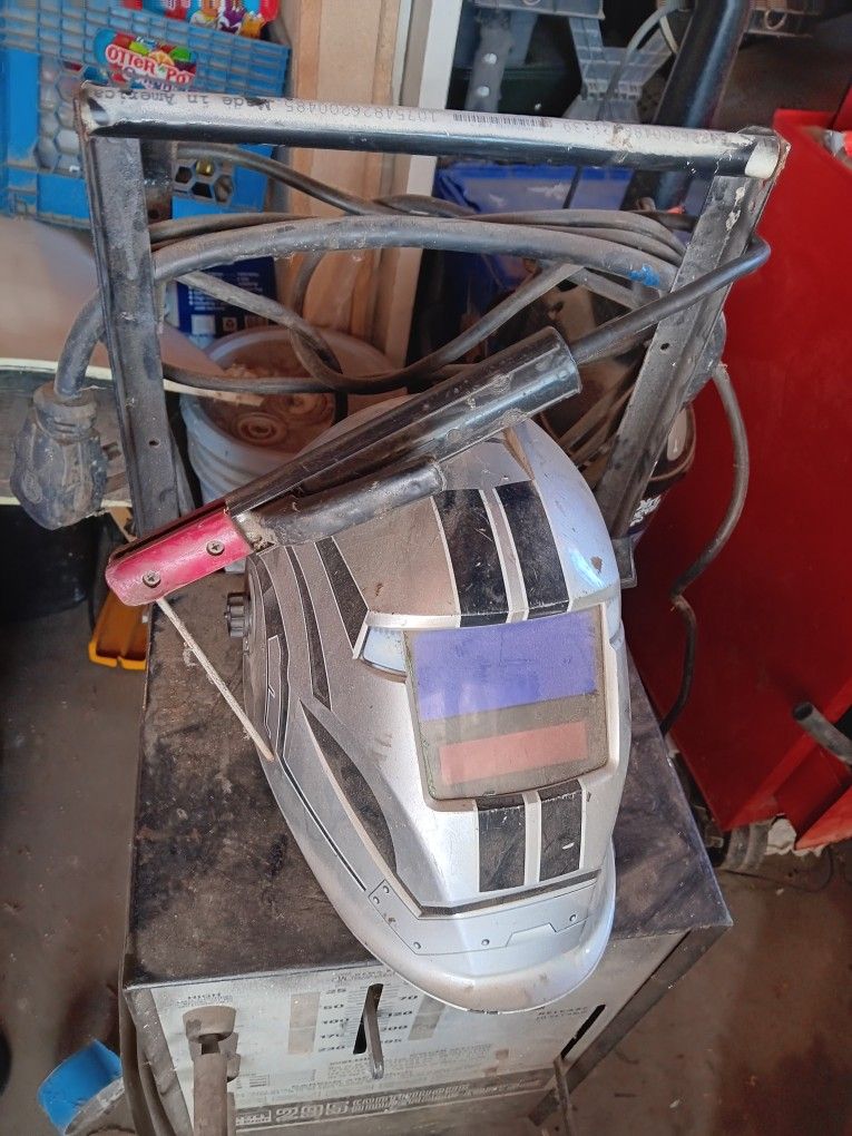 Welder With Helmet