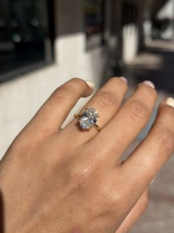 Oval solitaire diamond engagement ring