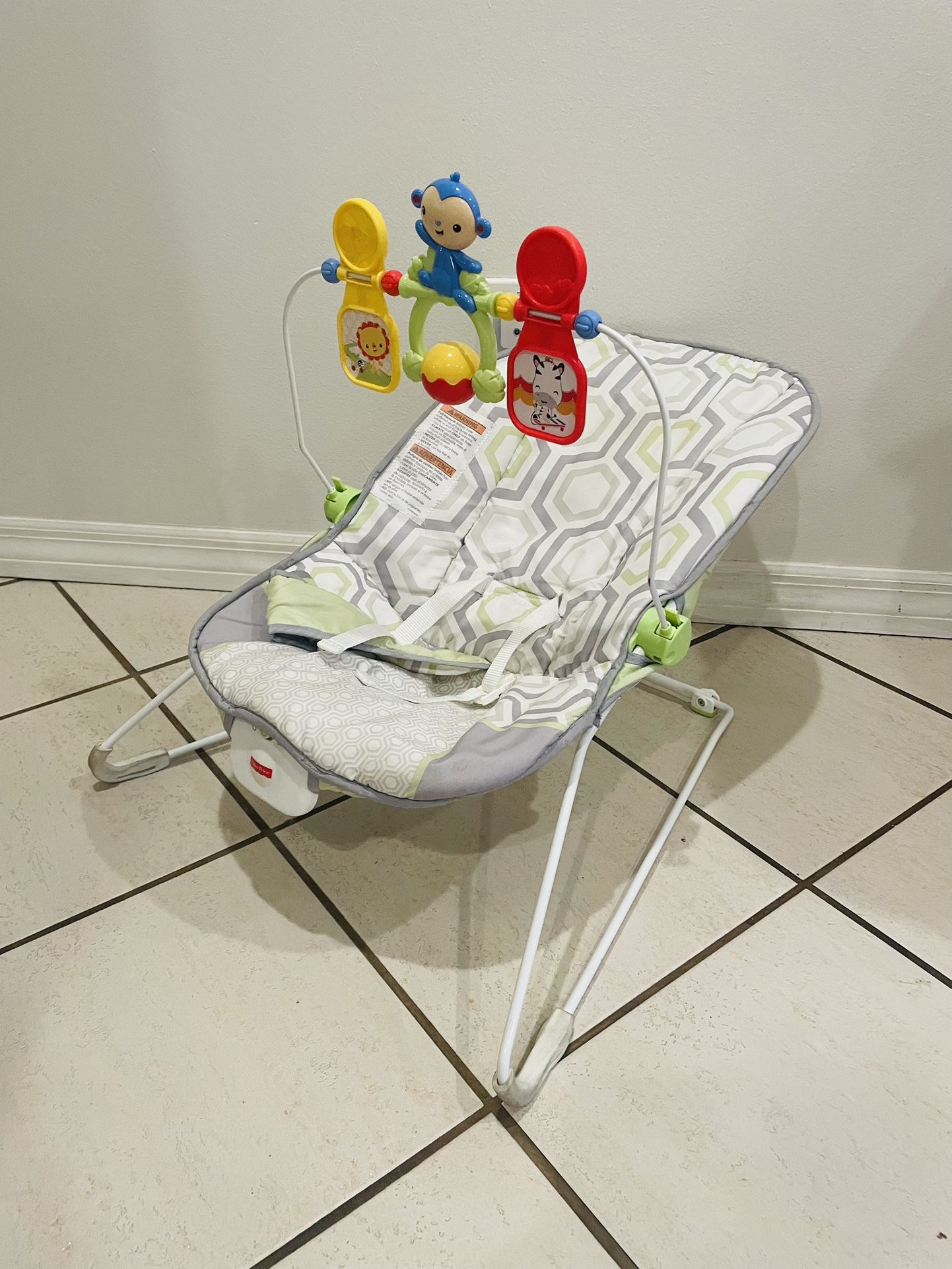 Fisher Price Baby s Bouncer Geo Meadow Portable Infant Soothing and Play seat with Toys and Vibrations for Sale in Miami FL OfferUp