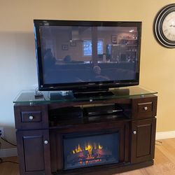 FREE PICK UP TODAY!! TV With TV Stand With Built In Electric Fire Place ! 