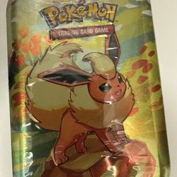 Sealed Prismatic Evolutions Mini Tin